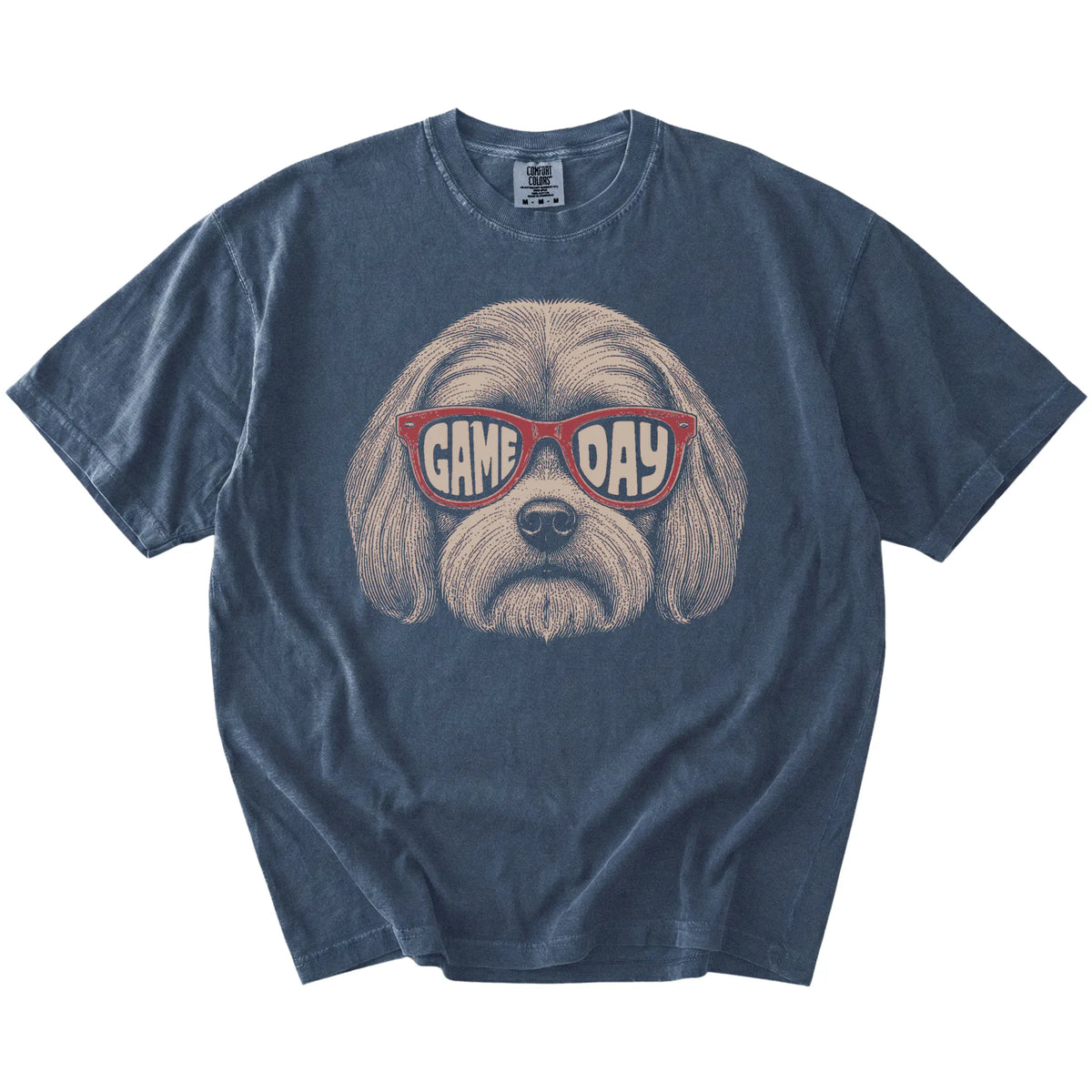 Maltese wearing red Game Day sunglasses on a Denim Comfort Colors® T-shirt