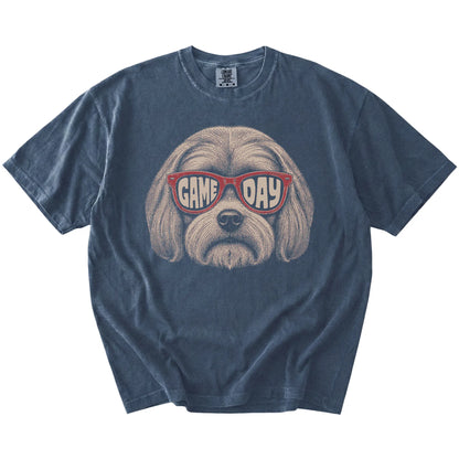 Maltese wearing red Game Day sunglasses on a Denim Comfort Colors® T-shirt
