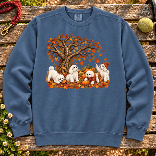 Four Maltese puppies with pumpkins beneath an autumn tree on a Denim garment-dyed sweatshirt