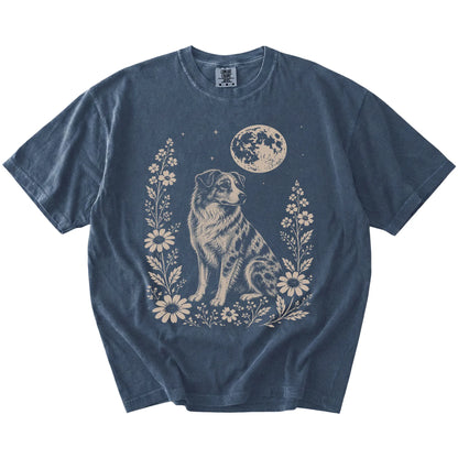 Australian Shepherd framed by flowers beneath the moon on a Denim Comfort Colors® T-shirt