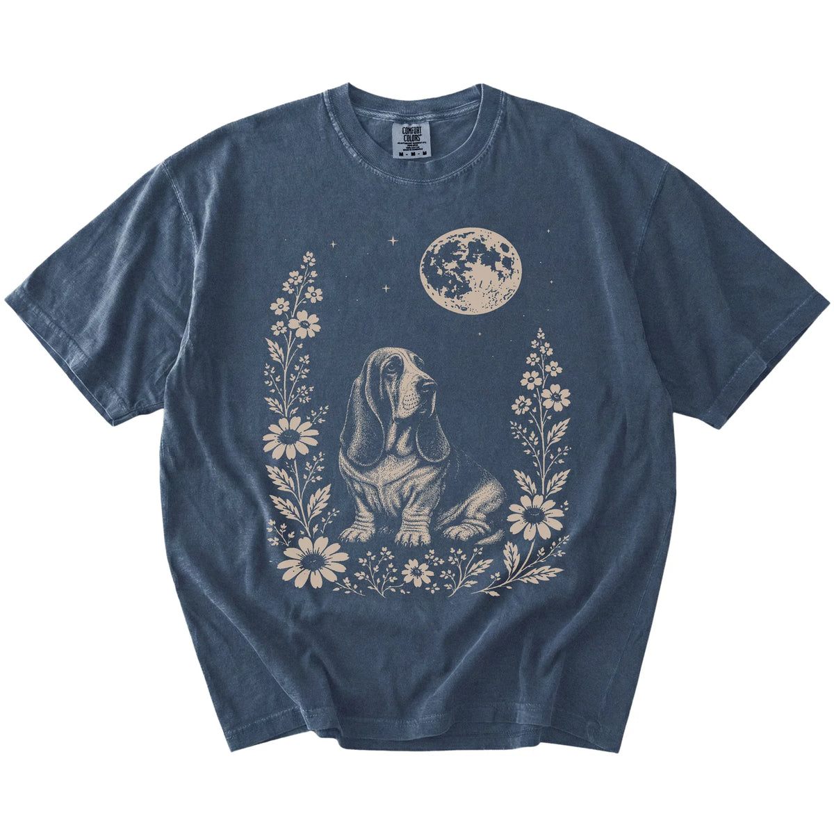 Basset Hound framed by flowers beneath the moon on a Denim Comfort Colors® T-shirt