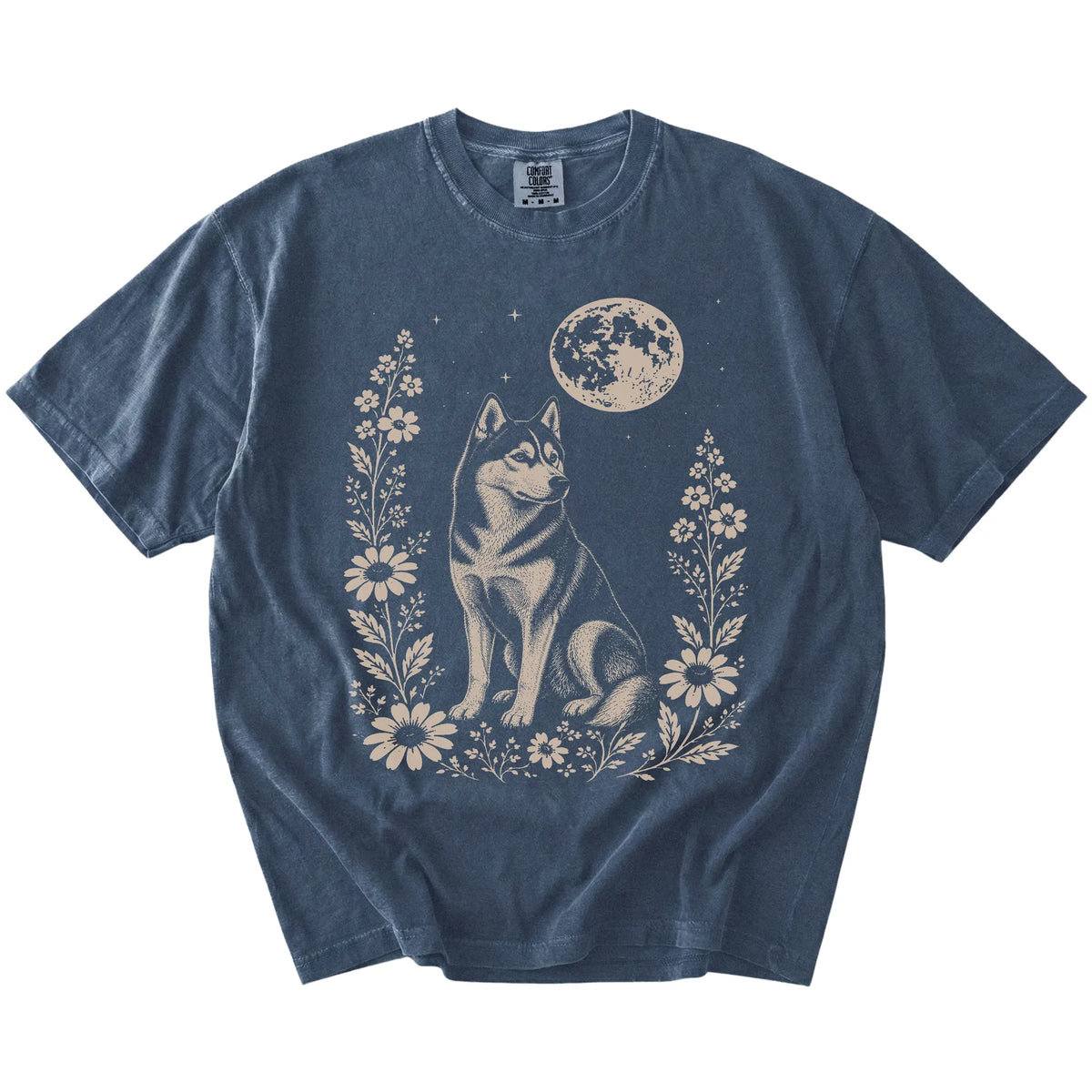 Husky framed by flowers beneath the moon on a Denim Comfort Colors® T-shirt