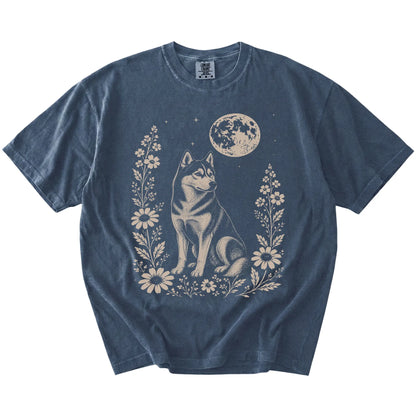 Husky framed by flowers beneath the moon on a Denim Comfort Colors® T-shirt