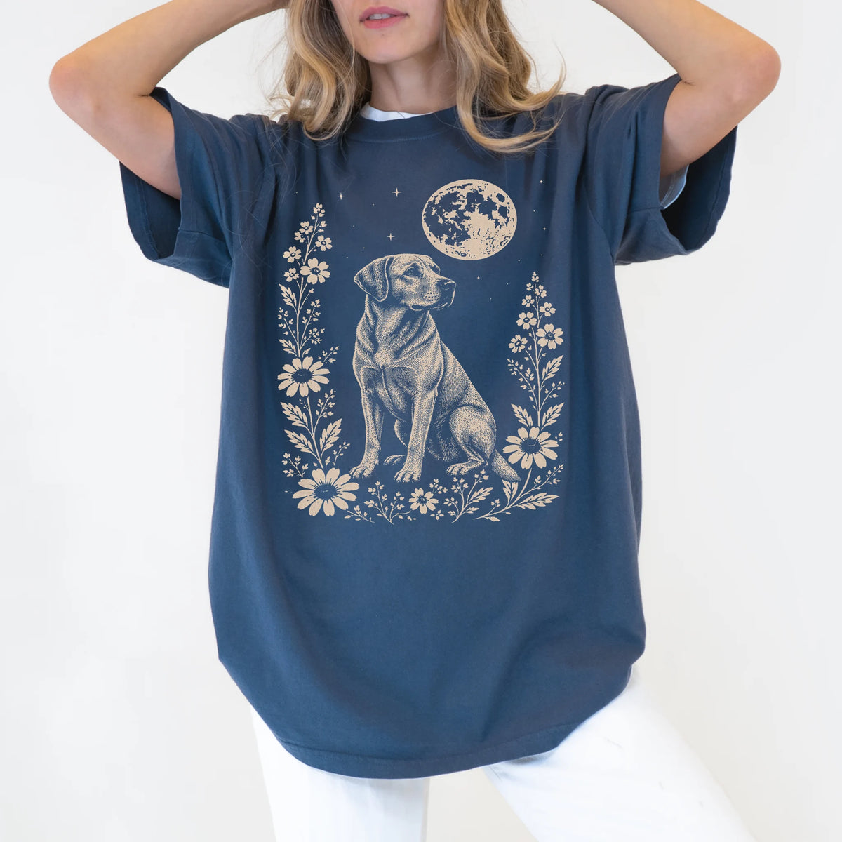 Model wearing a Denim Comfort Colors® T-shirt featuring Labrador Retriever framed by flowers beneath the moon