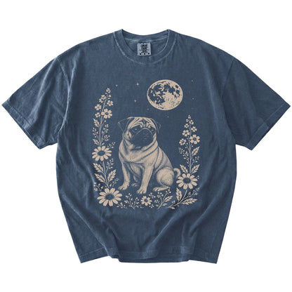 Pug framed by flowers beneath the moon on a Denim Comfort Colors® T-shirt