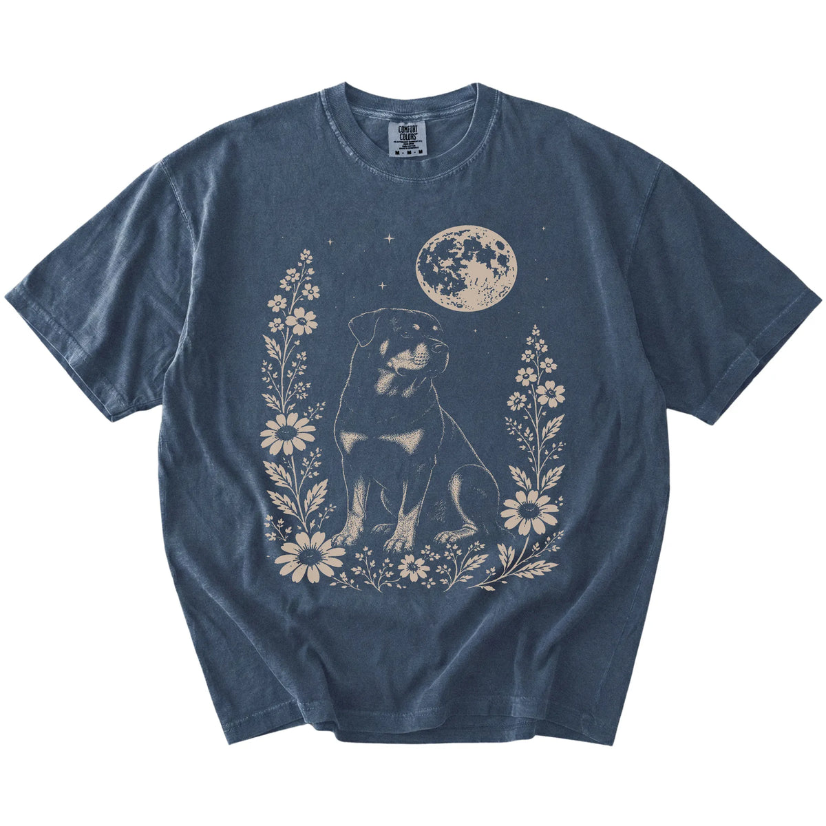 Rottweiler framed by flowers beneath the moon on a Denim Comfort Colors® T-shirt