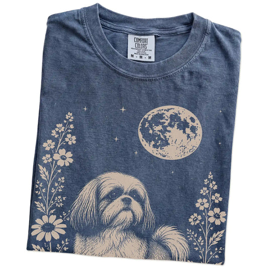Folded Denim Comfort Colors® T-shirt showing Shih Tzu framed by flowers beneath the moon