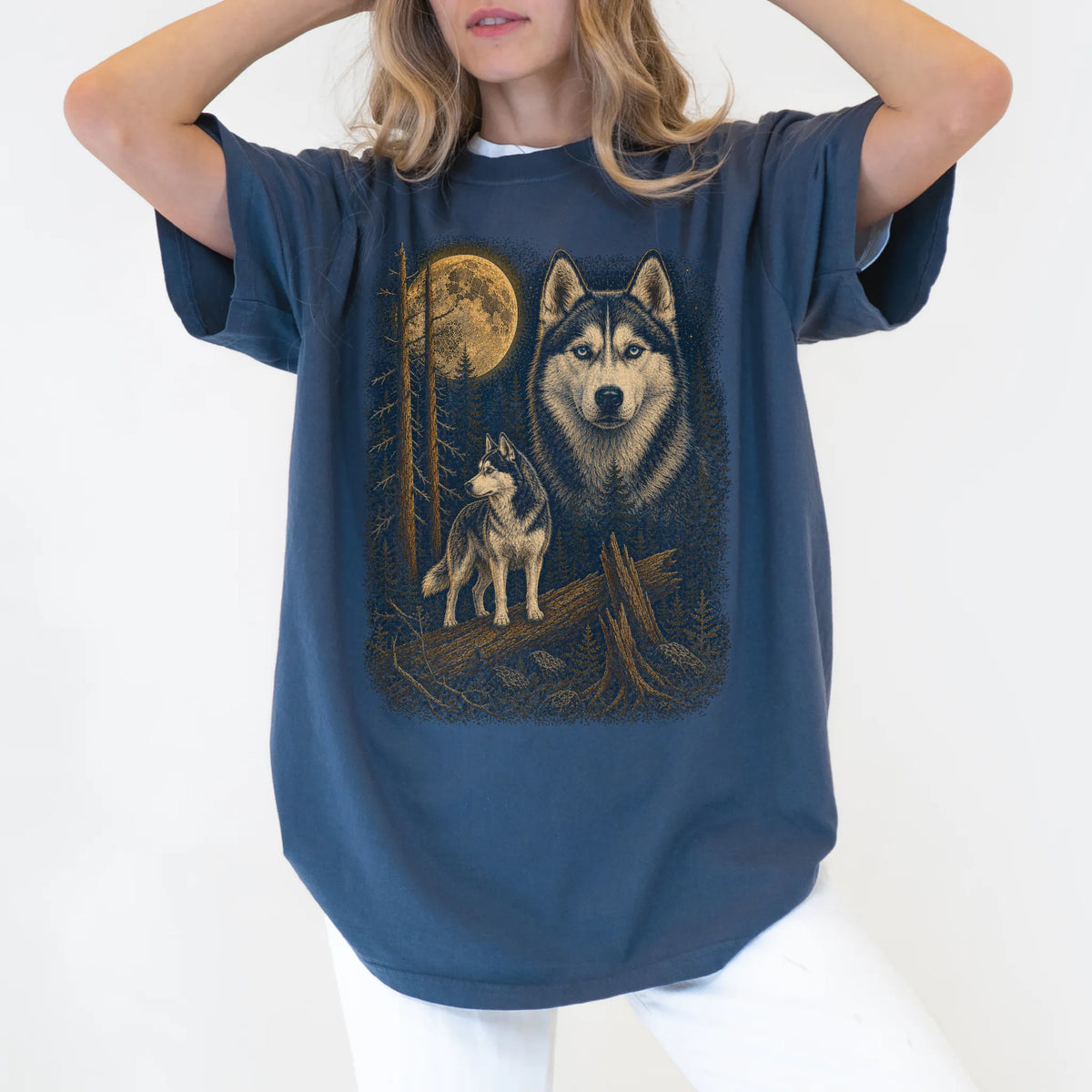 Person wearing a Denim Husky Wildwood Moon t-shirt