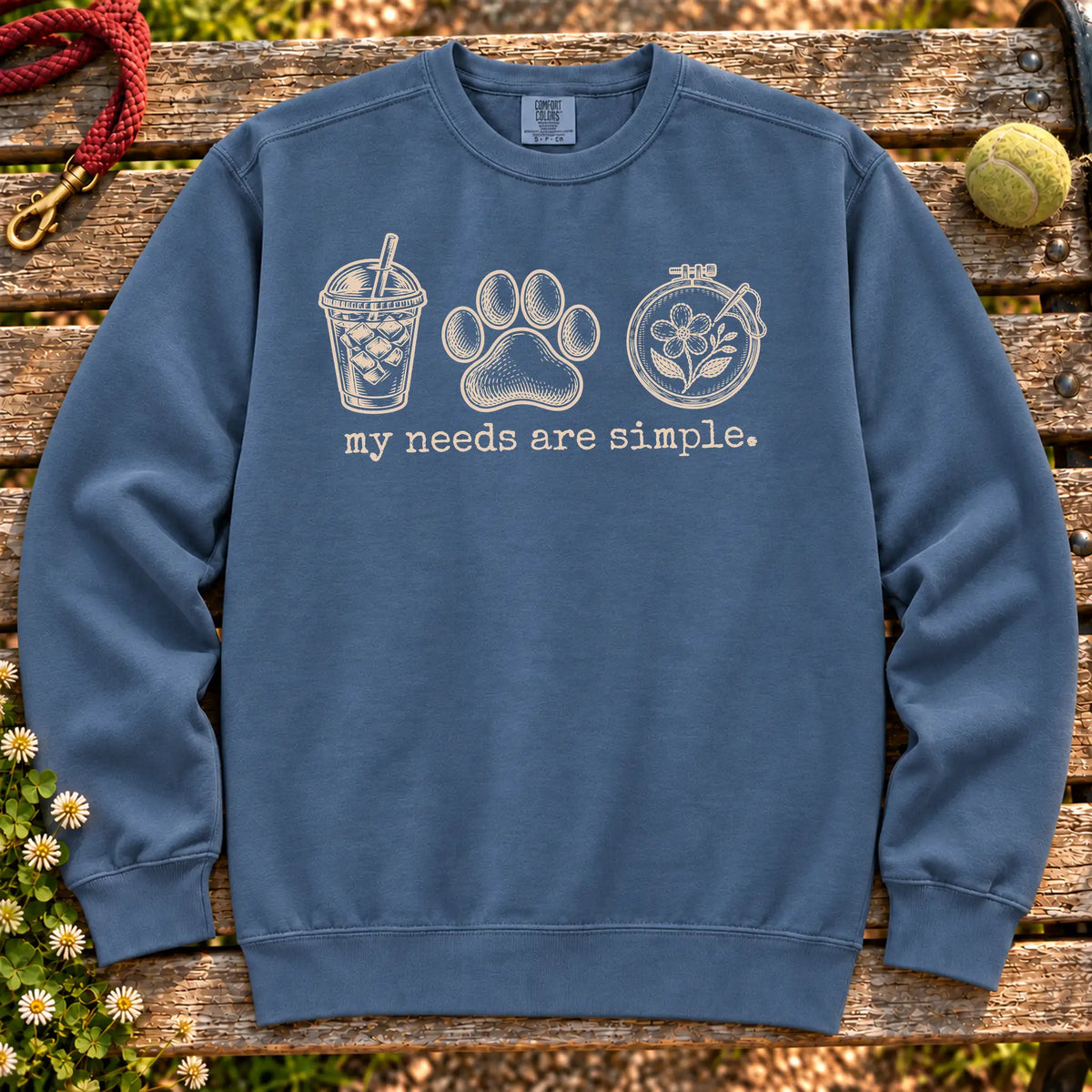 My Needs Are Simple coffee, dogs, and embroidery design on a Denim Comfort Colors sweatshirt