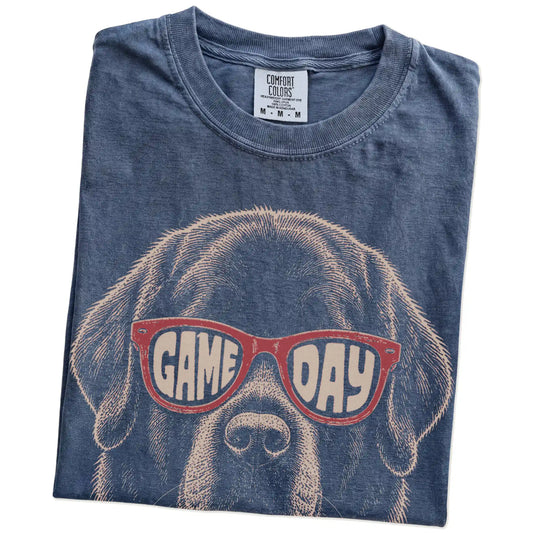 Folded Denim Comfort Colors® T-shirt showing newfie wearing red game day sunglasses