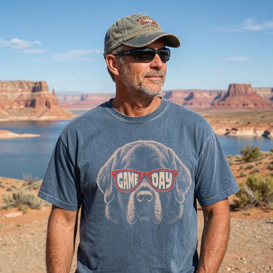 Model wearing a Denim Comfort Colors® T-shirt with newfie wearing red game day sunglasses