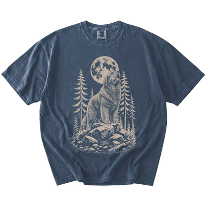 Newfie howling beneath the moon and pine trees on a Denim Comfort Colors® T-shirt