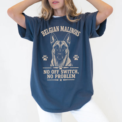 Model wearing a Denim Comfort Colors® T-shirt featuring Belgian Malinois design with “No Off Switch, No Problem” lettering