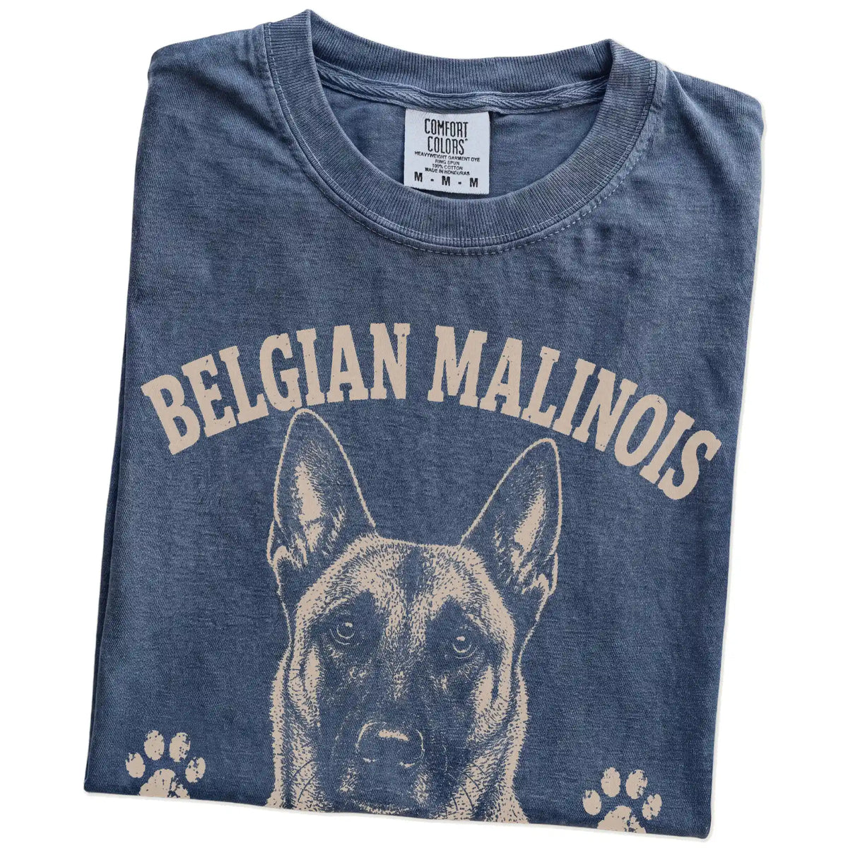Folded Denim Comfort Colors® T-shirt showing Belgian Malinois design with “No Off Switch, No Problem” lettering