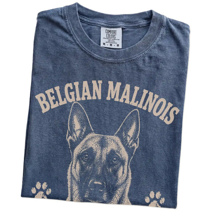 Folded Denim Comfort Colors® T-shirt showing Belgian Malinois design with “No Off Switch, No Problem” lettering