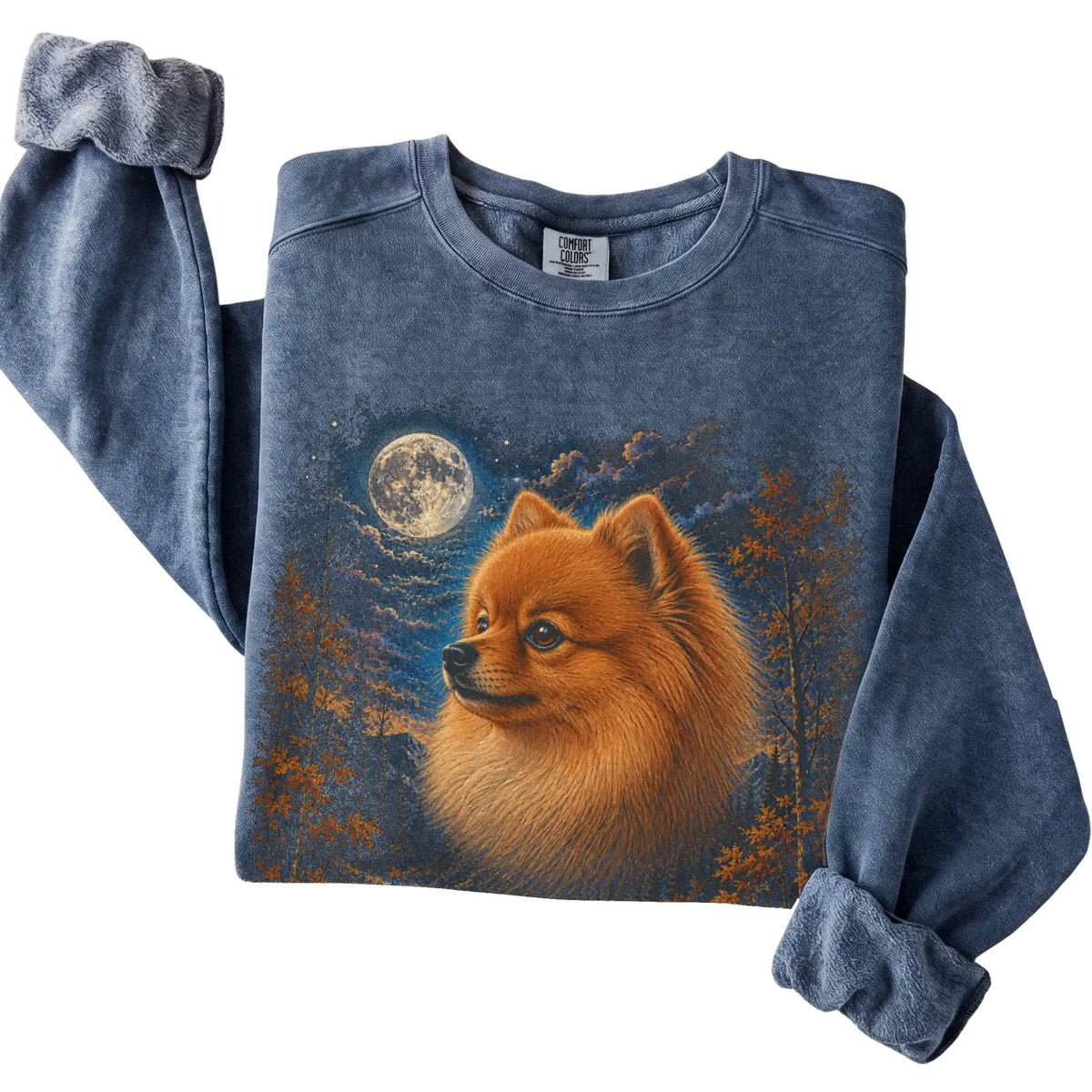 Folded denim sweatshirt with Pomeranian Autumn Moon artwork.