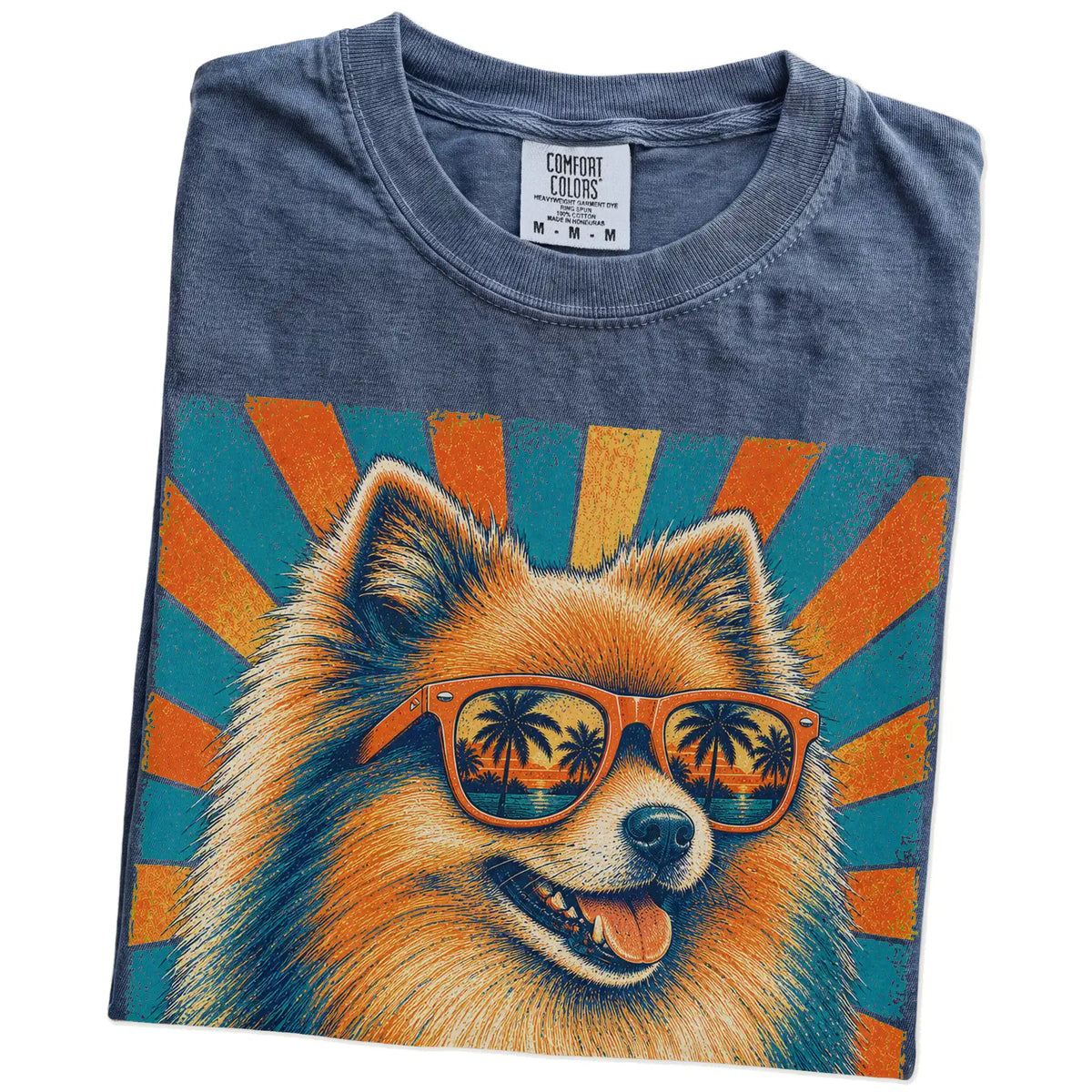 Retro Pomeranian Dad design on a Denim Comfort Colors T-shirt folded detail