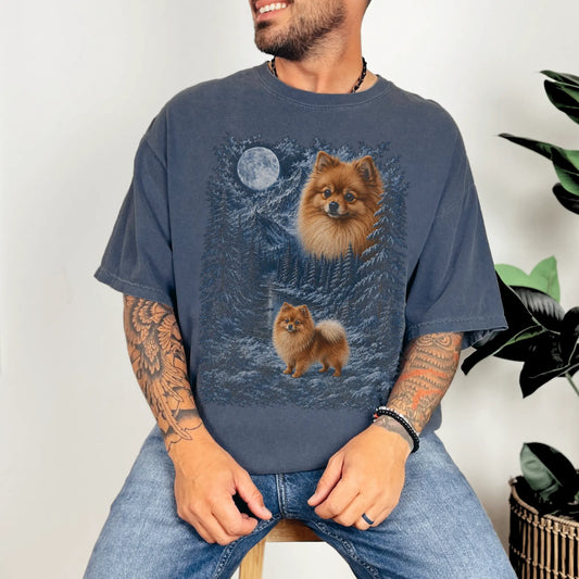 Model wearing a denim T-shirt with Pomeranian Winter Moon artwork.
