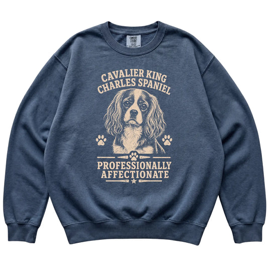 Denim Comfort Colors® sweatshirt featuring Professionally Affectionate - Cavalier King Charles…, laid-flat presentation