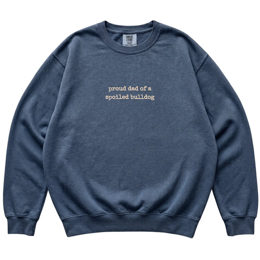 Denim Proud Dad of a Spoiled Bulldog Comfort Colors sweatshirt laid flat