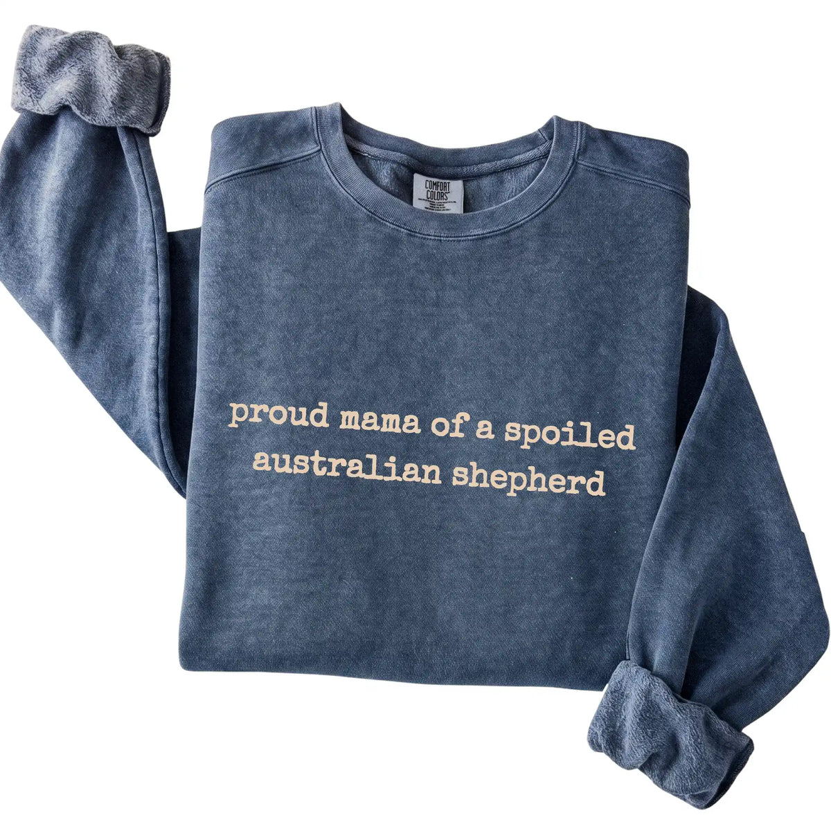 Denim Proud Mama of a Spoiled Australian Shepherd Comfort Colors sweatshirt folded to show the printed design
