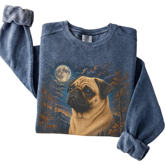 Folded denim sweatshirt with Pug Autumn Moon artwork.