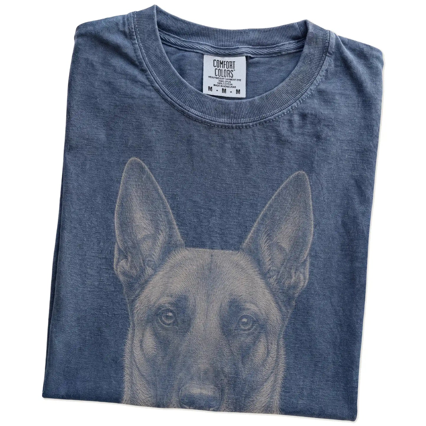 Folded Denim Comfort Colors® T-shirt showing a realistic drawing of a Belgian Malinois