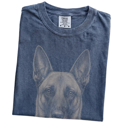 Folded Denim Comfort Colors® T-shirt showing a realistic drawing of a Belgian Malinois