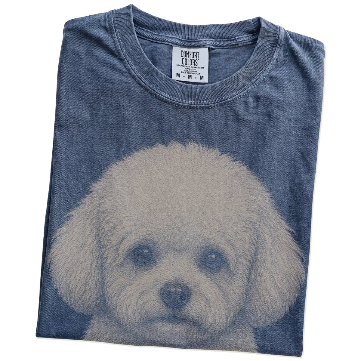 Folded Denim Comfort Colors® T-shirt showing a realistic drawing of a Bichon Frise