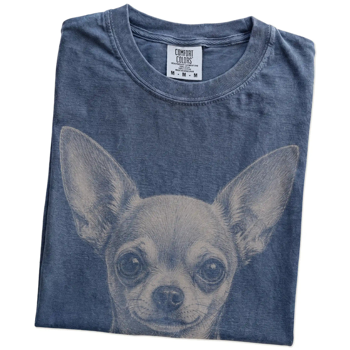 Folded Denim Comfort Colors® T-shirt showing a realistic drawing of a Chihuahua