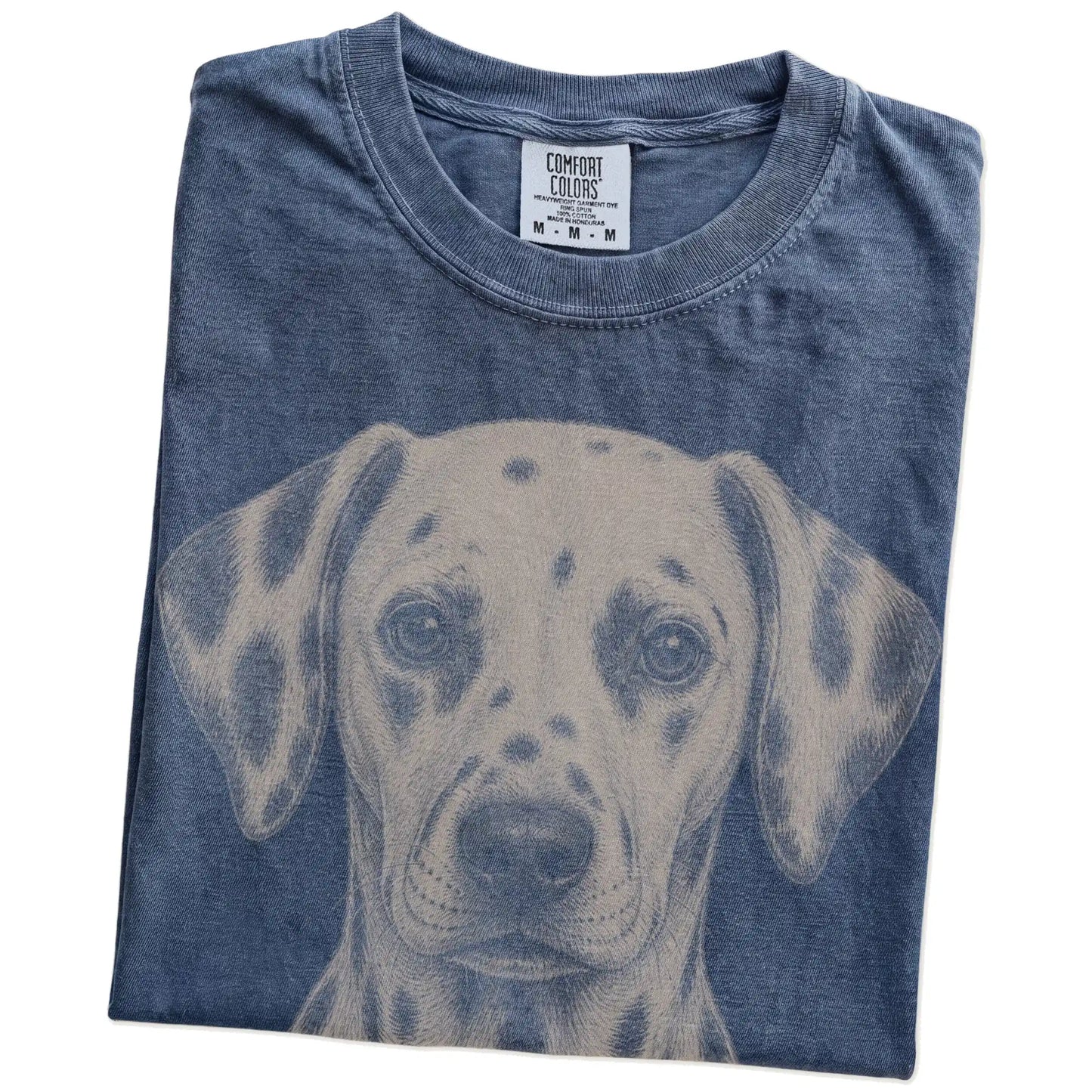 Folded Denim Comfort Colors® T-shirt showing a realistic drawing of a Dalmatian
