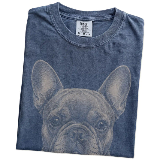 Folded Denim Comfort Colors® T-shirt showing a realistic drawing of a French Bulldog