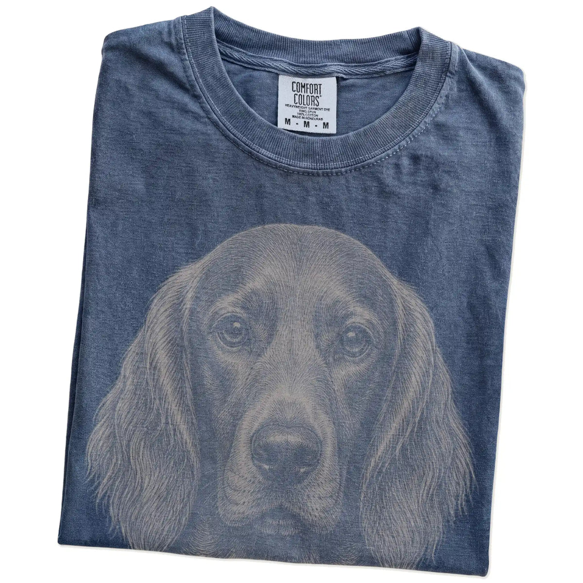 Folded Denim Comfort Colors® T-shirt showing a realistic drawing of a Irish Setter