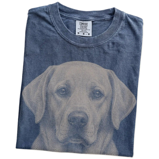 Folded Denim Comfort Colors® T-shirt showing a realistic drawing of a Labrador Retriever