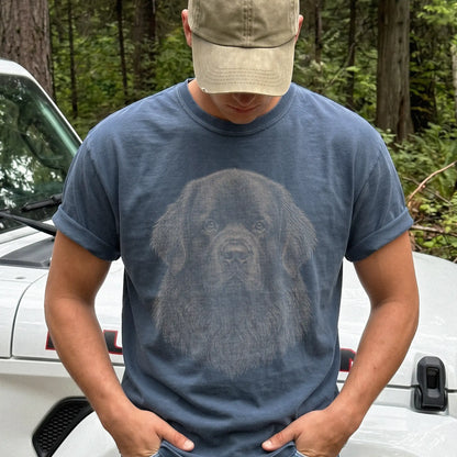 Model wearing a Denim Comfort Colors® T-shirt with a realistic drawing of a Newfie