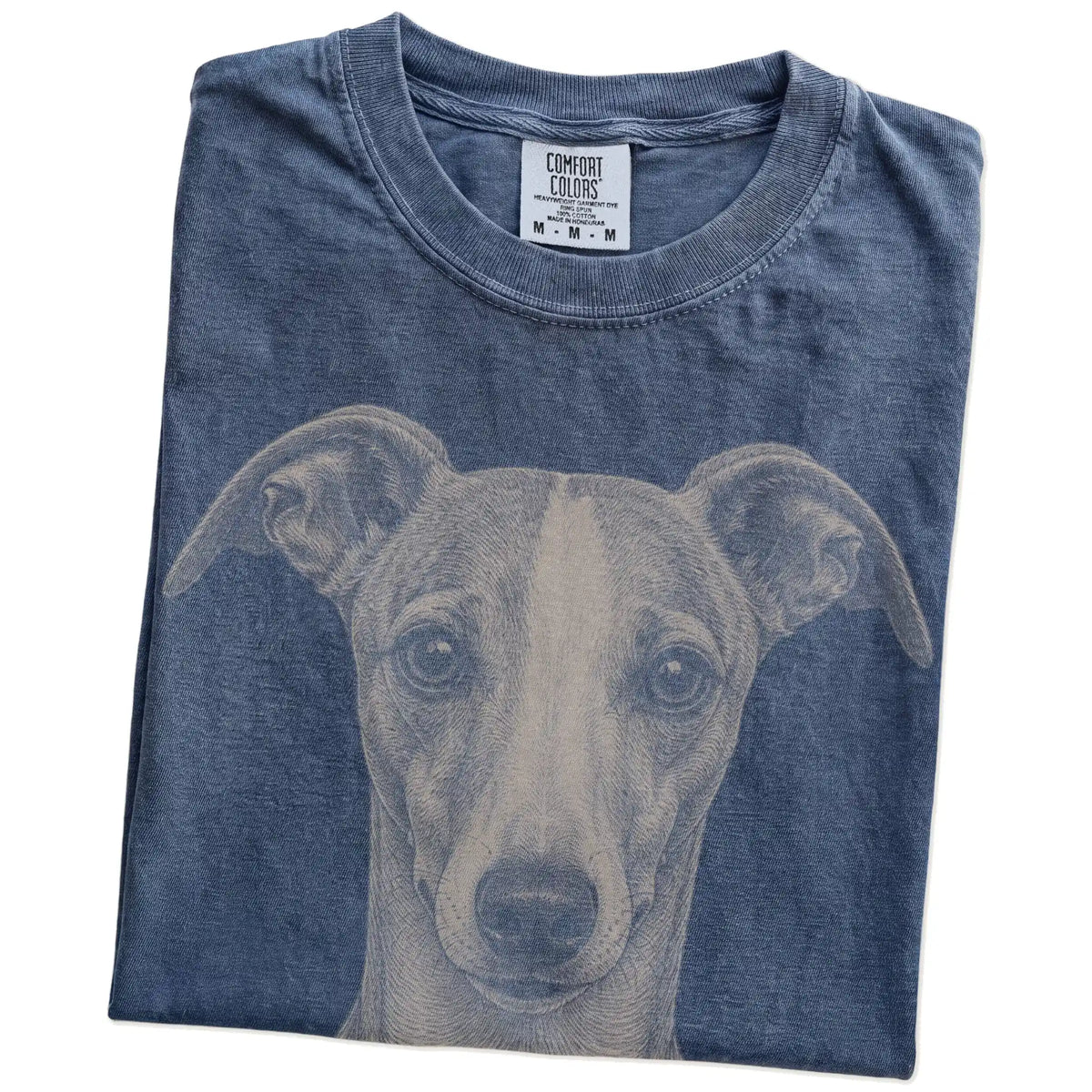 Folded Denim Comfort Colors® T-shirt showing a realistic drawing of a Whippet