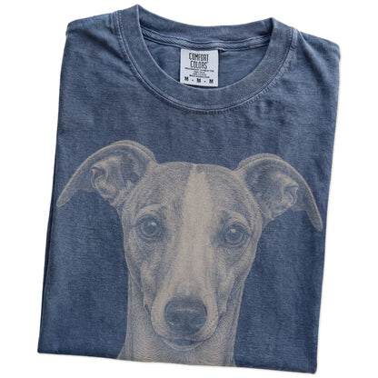 Folded Denim Comfort Colors® T-shirt showing a realistic drawing of a Whippet