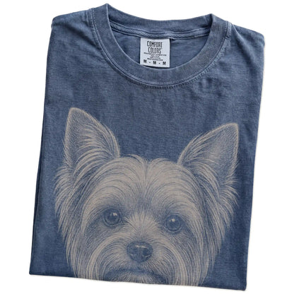 Folded Denim Comfort Colors® T-shirt showing a realistic drawing of a Yorkie