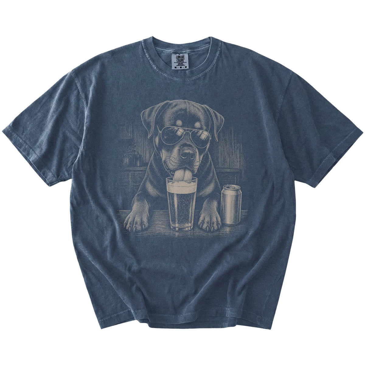 Rottweiler sneaking a drink from a foamy pint at home on a Denim Comfort Colors® t-shirt