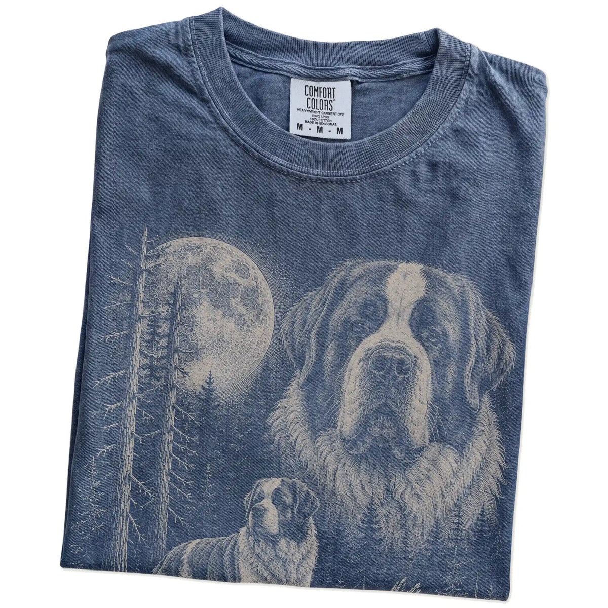 Folded Denim Saint Bernard Moonlit Forest T-Shirt showing the graphic