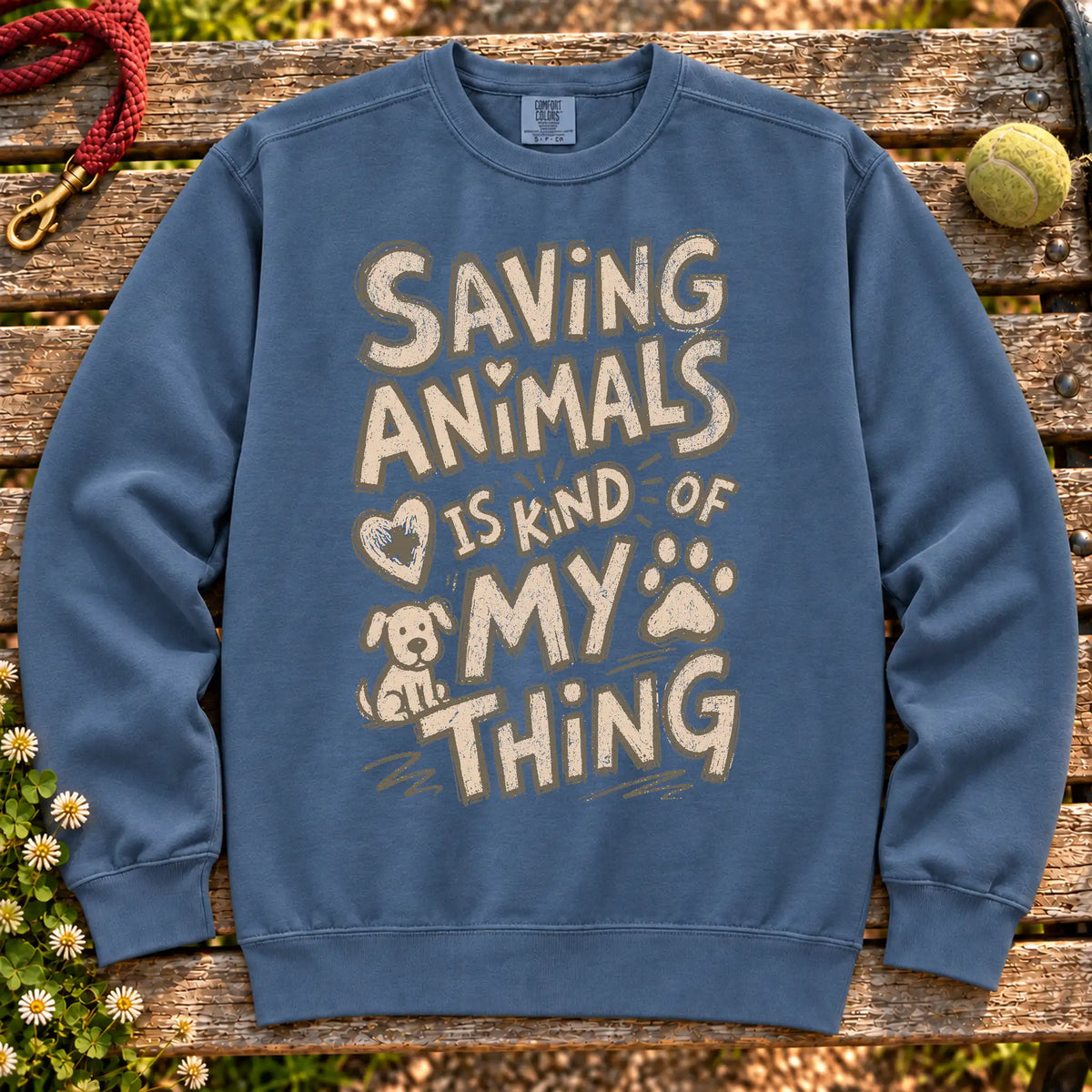 Saving Animals is kind of my thing on a Denim crewneck sweatshirt, shown flat