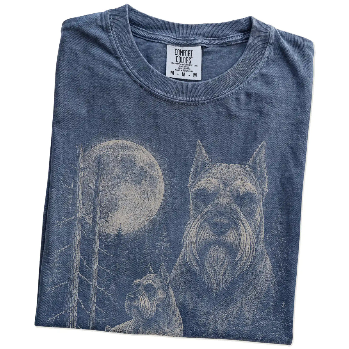 Folded Denim Schnauzer Moonlit Forest T-Shirt showing the graphic