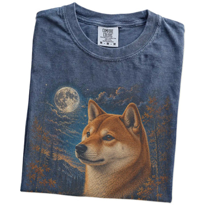 Folded denim T-shirt with Shiba Inu Autumn Moon artwork.