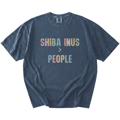 “Shiba Inus > People” text on a Denim Comfort Colors® T-shirt