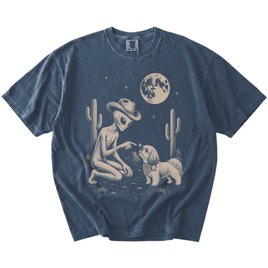 Cowboy alien fist-bumping a Shih Tzu beneath the moon on a Denim Comfort Colors® T-shirt