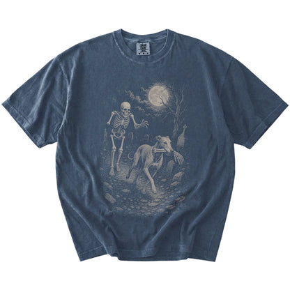 denim T-shirt with a Greyhound carrying a skeleton arm through a graveyard.