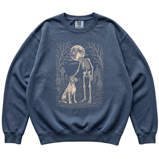 Skeleton petting a Boxer in a graveyard on a Denim sweatshirt