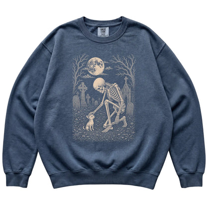 Skeleton petting a Chihuahua in a graveyard on a Denim sweatshirt
