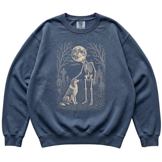 Skeleton petting a Collie in a graveyard on a Denim sweatshirt