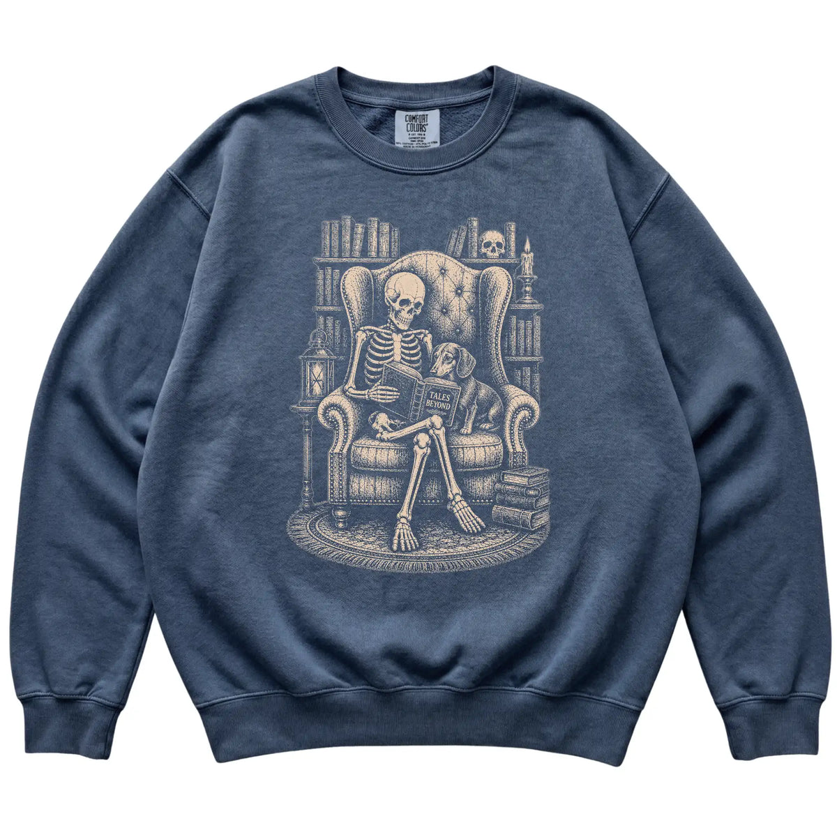 Skeleton reading Tales Beyond to a Dachshund on a Denim sweatshirt